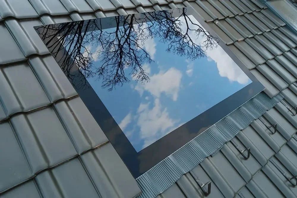 Fixed flush skylight installed on a tile roof